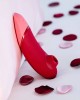stimulateur clitoridien Womanizer Next, Sensual Collection, rouge, avec pétales