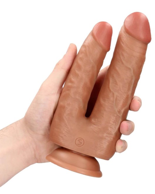 gode réaliste double pénétration à ventouse, RealRock, dans une main