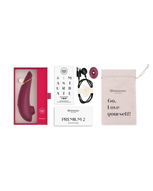 womanizer premium 2, stimulateur clitoridien air pulsé, rouge, boîte et contenu