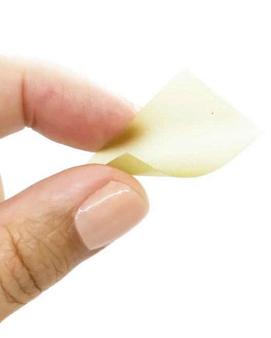 bandes mentholées pour sexe oral Slow Sex, Bijoux Indiscrets, dans une main