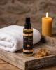 Huile de massage sensuelle et gourmande senteur miel crémeux, présentation produit salle de bain