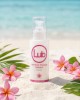 photo produit, lubrifiant, LB, Monoï, 125ml, ambiance, plage, été, massage intégral