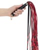 martinet bdsm en simili cuir tressé, Easytoys fetish, dans une main