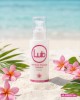 photo produit, lubrifiant, LB, Monoï, 125ml, ambiance, plage, été, massage intégral