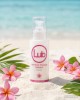 photo produit, lubrifiant, LB, Monoï, 125ml, ambiance, plage, été, massage intégral