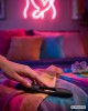 stimulateur pour couple télécommandé All In, Paradise Boutik, noir, posé sur lit