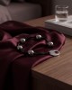 chapelet en métal 5 perles, Paradise boutik, sur table