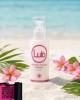 photo produit, lubrifiant, LB, Monoï, 125ml, ambiance, plage, été, massage intégral